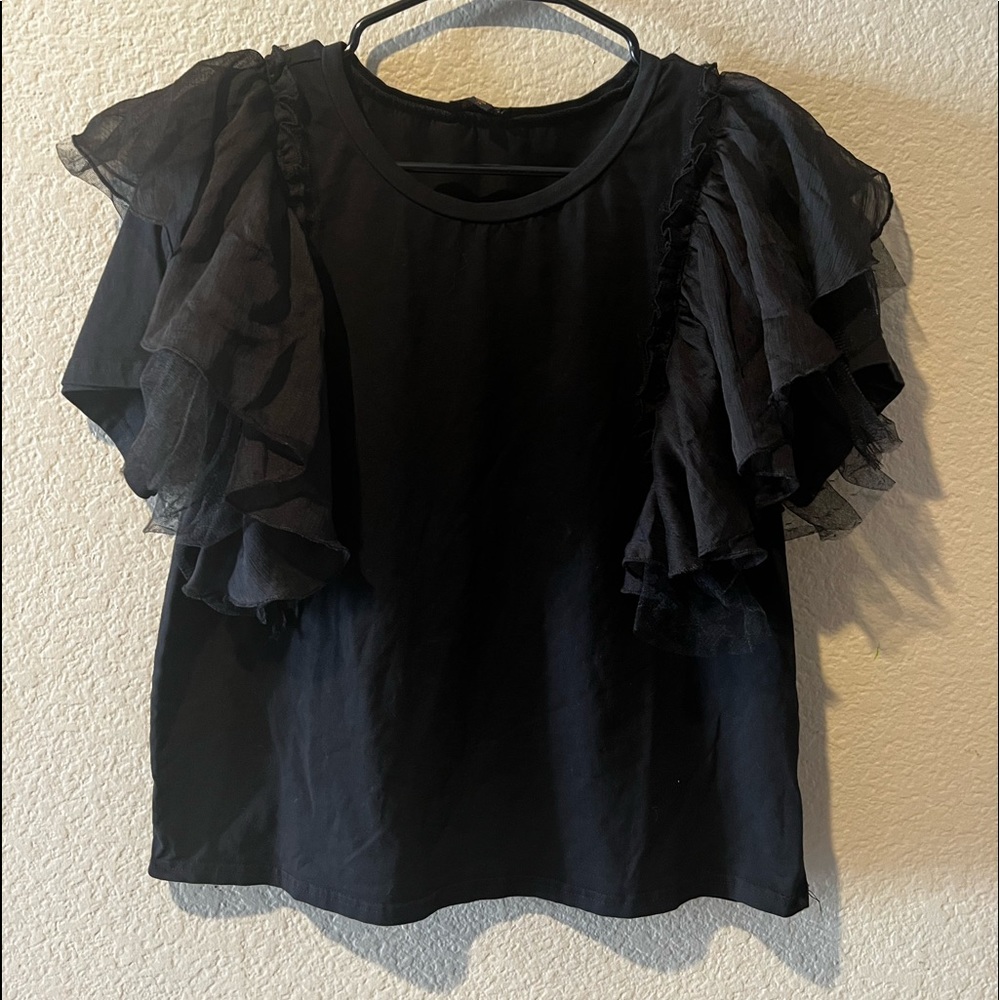 Black ruffle shirt